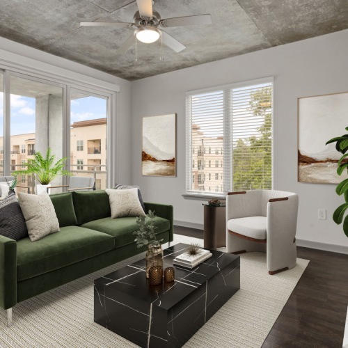 Trendy Living in Downtown Raleigh living area that includes ample seating spaces and bright lighting