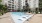 pool with lounge chairs and sundeck 